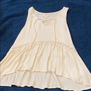 Beige sleeveless blouse